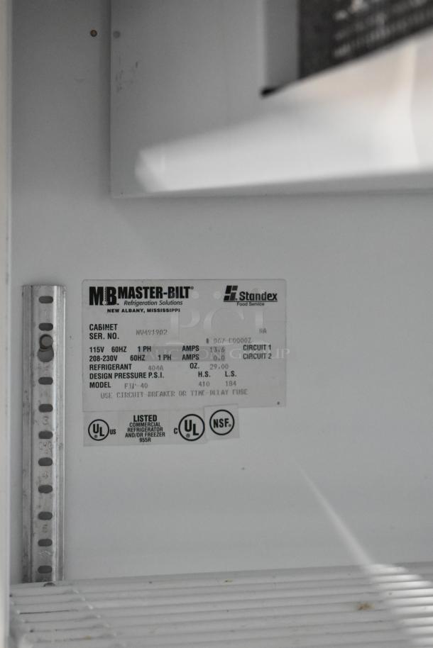 Master Bilt FTP-40 deli display case label showing model, voltage (208/230V), phase (1), and UL/NSF certifications.
