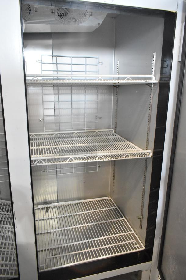 2025 Leader ESFR54 Stainless Steel 2-Door Cooler, poly-coated racks, 115V, 1-Phase, excellent condition.