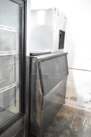 Hoshizaki F-1001MWH stainless steel commercial ice machine on large ice bin, 208-230V, 1 phase, used condition.