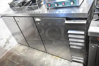 Beverage Air BB72 stainless steel commercial 3-door undercounter cooler. Features 115 volts, 1 phase. Slight wear visible.