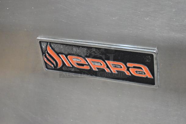 Sierra stainless steel logo on a commercial gas-powered range.