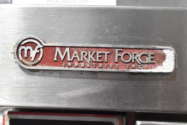 Market Forge stainless steel commercial steam cabinet with logo. Single deck model, sturdy construction, ideal for professional kitchens.