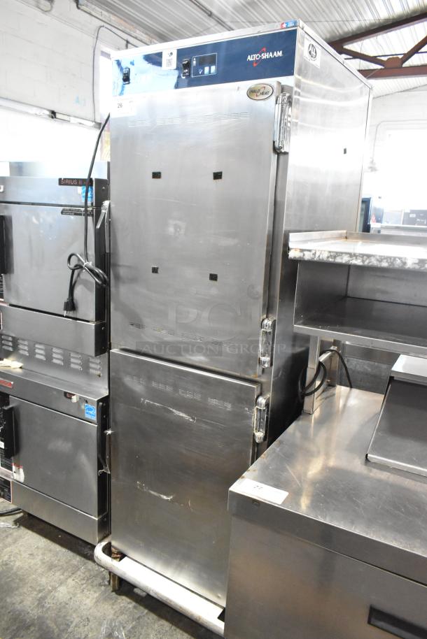 Alto Shaam 1200-UP stainless steel mobile holding cabinet, 16 pan, with Dutch doors and commercial casters, 120V, 1 phase.