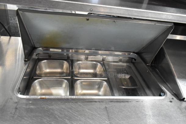 Delfield stainless steel sandwich salad prep table, Mega Top, with 4 drawers, over shelf, Bain Marie pans, 115 volts, 1 phase.