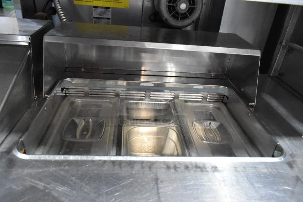 Delfield stainless steel sandwich salad prep table with mega top, 4 drawers, overshelf, and bain marie pans. 115V, 1 phase.
