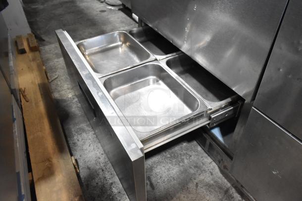 Delfield stainless steel sandwich prep table with bain marie top, 4 drawers, over shelf; 115V, 1 phase.