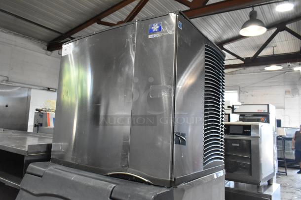 Manitowoc SY0854A stainless steel commercial ice head on bin, 208-230V, 1 phase, in good condition, for auction.