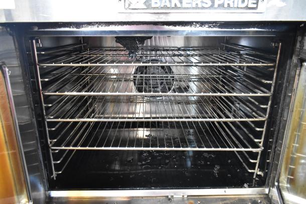 Bakers Pride BCO11G stainless steel commercial gas convection oven with view-through doors, metal racks, and thermostatic controls.