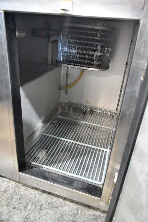 2017 Leader LB36S/C stainless steel 2-door undercounter cooler, interior view. Commercial casters, 115V, used condition.