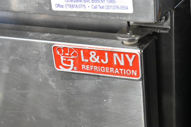 L&J NY JUC-60 stainless steel 2-door undercounter cooler with commercial casters, 115 volts, 1 phase.