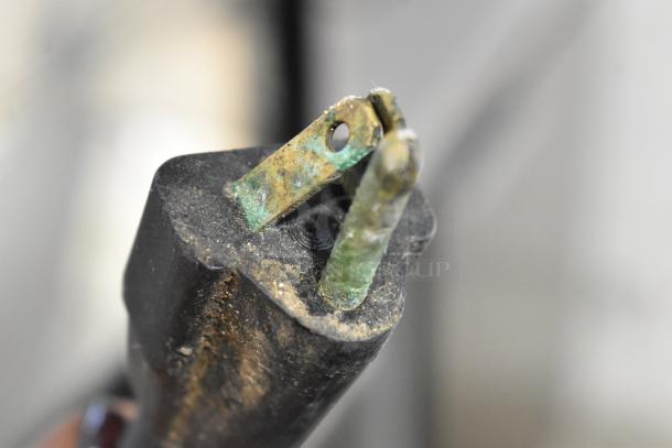 Corroded power plug of Stainless Steel Commercial 2 Door Undercounter Cooler, indicating wear. 115 Volts, 1 Phase.
