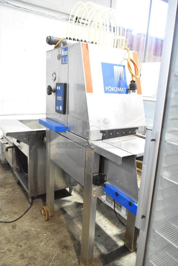 Pokomat P16/320 SI commercial brine meat injection machine, metal, on casters, 220 volts, excellent condition.