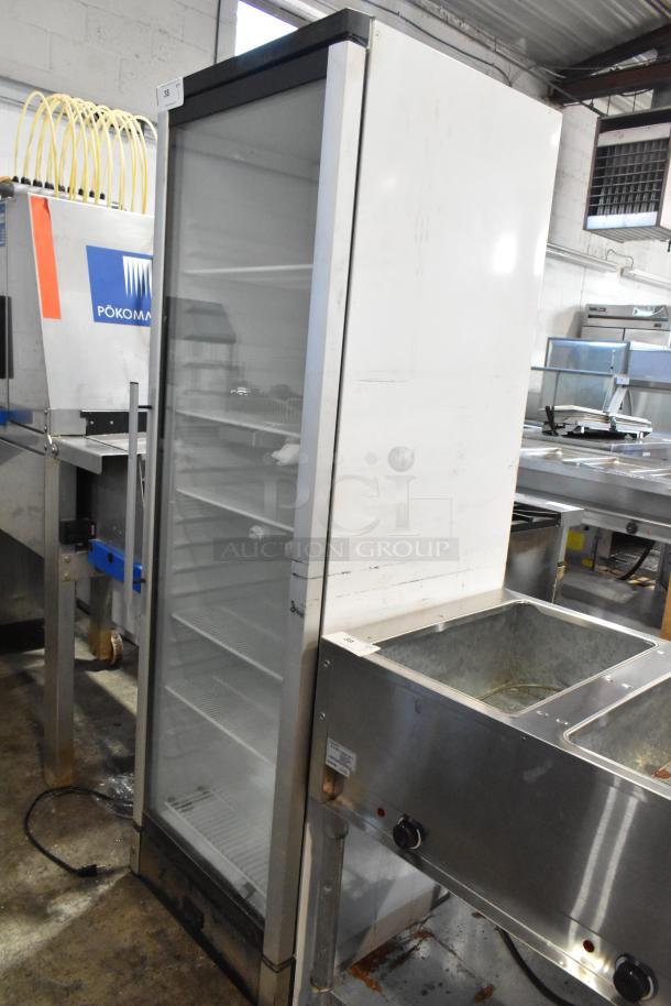 2022 Summit SCR1301 commercial single-door cooler, metal frame, poly-coated racks, 115V, 1 phase, good condition.