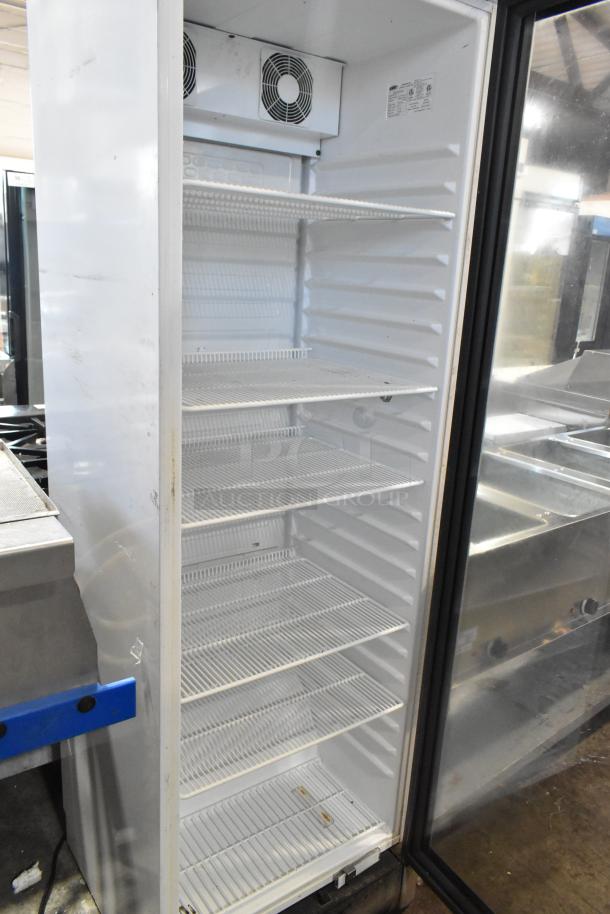 2022 Summit SCR1301 commercial cooler, single door, metal, poly-coated racks, 115V, 1-phase, excellent condition.