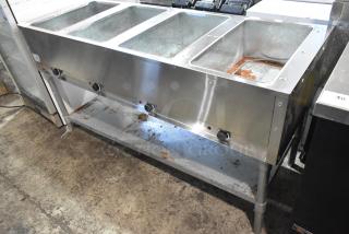 Adcraft ST-240/4 stainless steel commercial steam table with 4 bays, electric powered, 208/240 volts, used condition.