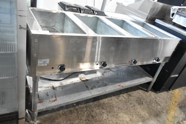 Adcraft ST-240/4 4 Bay Steam Table, stainless steel, electric-powered, 208/240V, used condition, visible controls and labels.