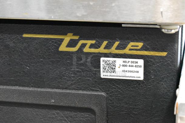 True TBB-24-48 Metal Undercounter Cooler, 2 doors, visible True logo, help desk label with contact information.