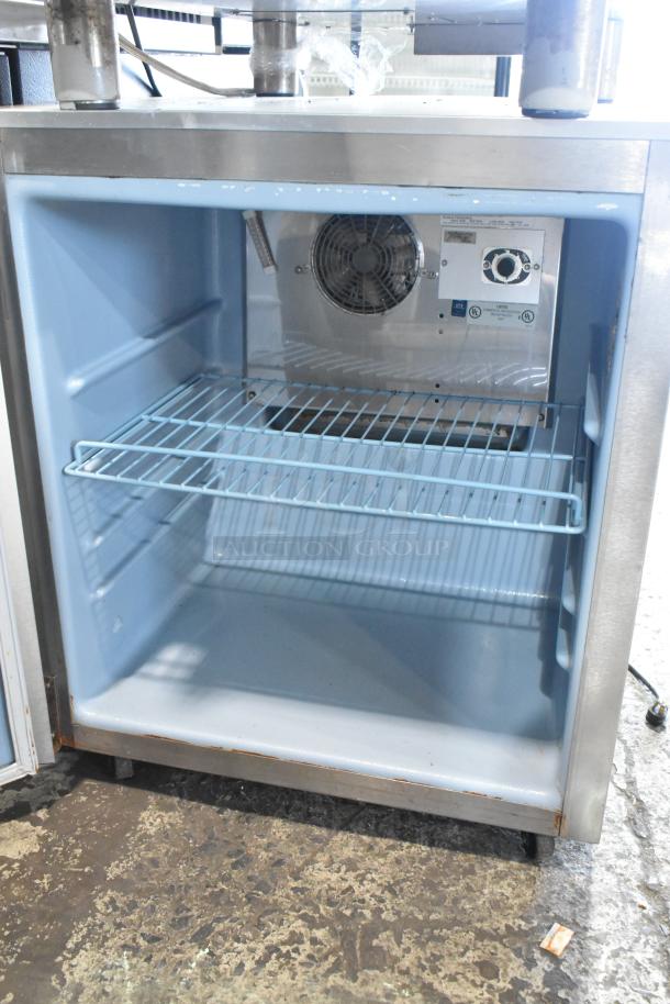 Delfield 406CA-DHL-DD1 stainless steel undercounter cooler, single door, 115 volts, 1 phase, interior view with shelf.
