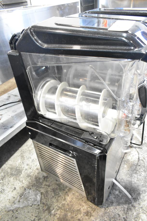 Metal commercial countertop slushie machine with 3 hoppers, 115 volts, 1 phase. Features visible transparent hopper covers.