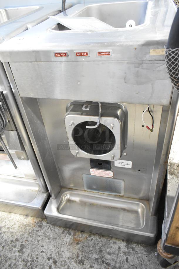Taylor 340-27 stainless steel single flavor frozen beverage machine, 208-230 volts, 1 phase, used condition, visible controls.