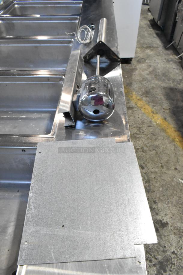 Taylor 340-27 stainless steel commercial countertop single flavor frozen beverage machine, 208-230 volts, 1 phase, shown dismantled.