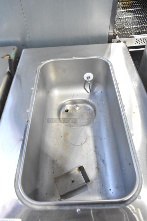 Taylor 340-27 stainless steel frozen beverage machine, used. Countertop model, single flavor, 208-230V, 1 phase power.