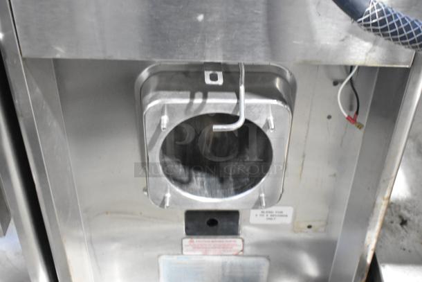 Taylor 340-27 stainless steel countertop single flavor frozen beverage machine, 208-230V, 1 phase. Visible caution labels.