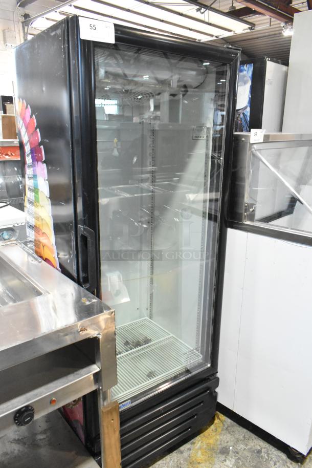 Imbera VR12 metal commercial single door reach-in cooler, 115 volts, 1 phase. Black exterior, glass door, interior shelving visible.