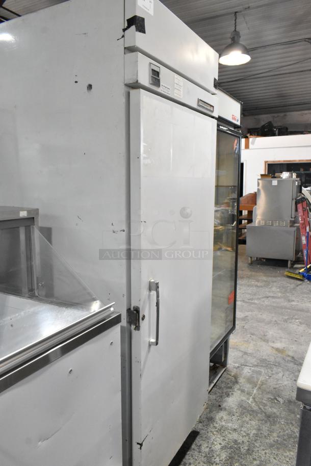 Kelvinator T3OHSP-4 metal commercial single door hardening cabinet with poly coated racks, visible markings, 115 volts, 1 phase.