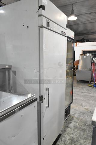 Kelvinator T3OHSP-4 metal commercial single door hardening cabinet with poly coated racks, visible markings, 115 volts, 1 phase.