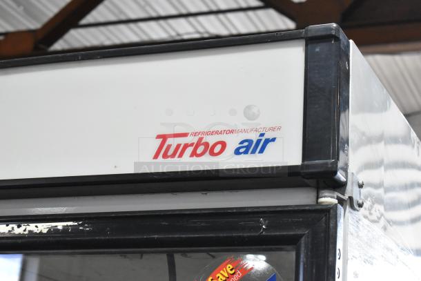 Turbo Air TGM-22R metal commercial single-door cooler merchandiser, 115 volts, showing brand logo and part of the door.