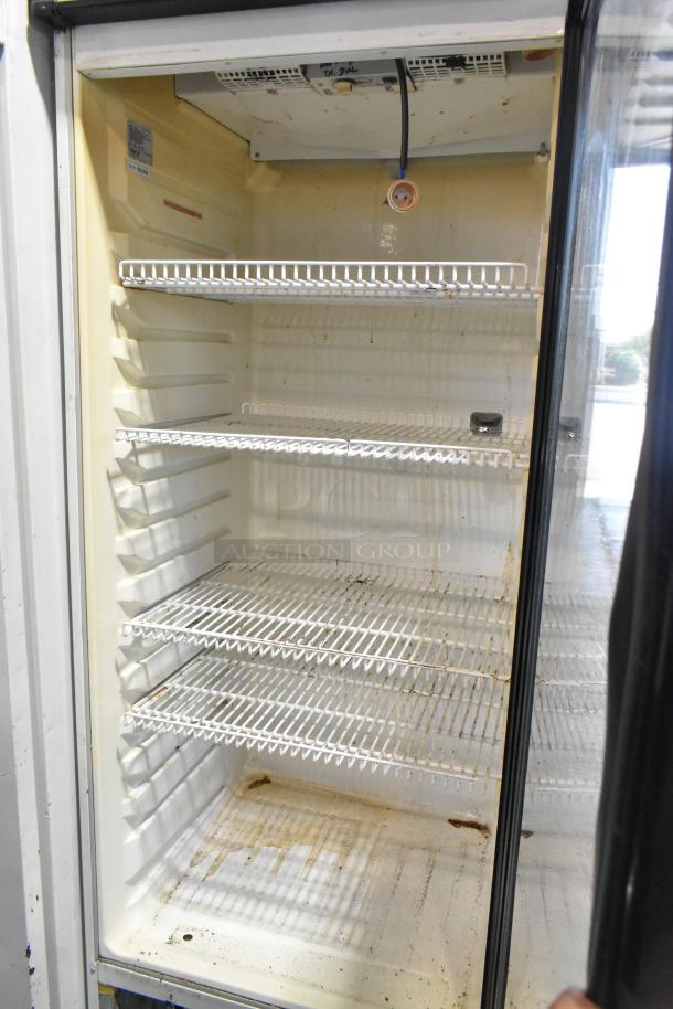 Turbo Air TGM-22R Commercial Single Door Reach-In Cooler, metal, shelves, visible wear, 115V, 1 Phase, ideal for merchandising.
