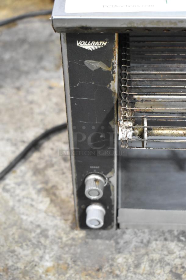 Vollrath JT1H stainless steel countertop conveyor toaster oven, electric, 120V, visible wear, dual control knobs.