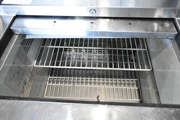 U Star USGF-1L Metal Commercial Back Bar Cooler, sliding lid, 115 volts, 1 phase, clean interior, two metal shelves.