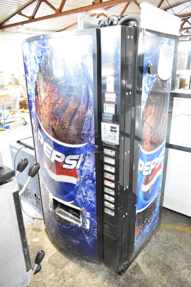Metal commercial vending machine with bill acceptor, Pepsi branding. Missing key. 115 volts, 1 phase. Scratches visible.