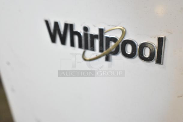 Whirlpool WFW5620HW2 metal front load washer, 120V, 1 phase, visible brand logo, minor exterior wear.