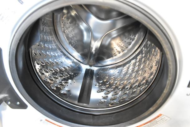 Whirlpool WFW5620HW2 front load washer, stainless steel drum, 120 volts, 1 phase, excellent condition.