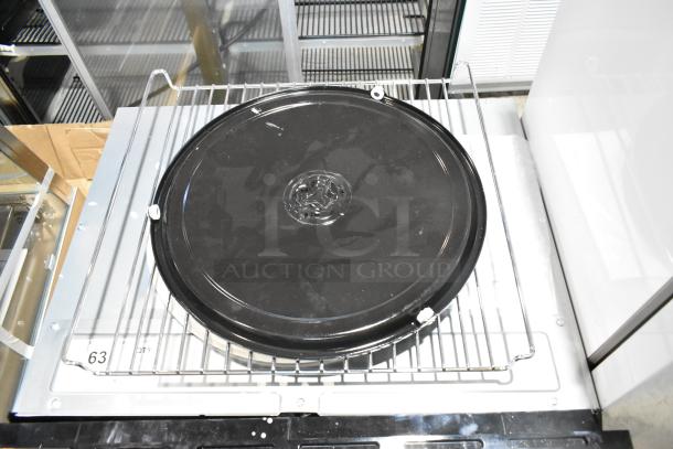 Brand new 2025 KoolMore KM-MD-1SS stainless steel microwave drawer with glass damage and 120V, 1 phase label visible.