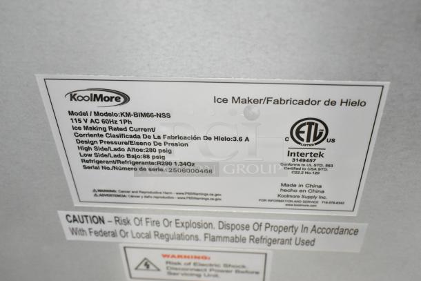 Brand new KoolMore KM-BIM66-NSS stainless steel ice maker label, showing model details, design pressure, and refrigerant info.