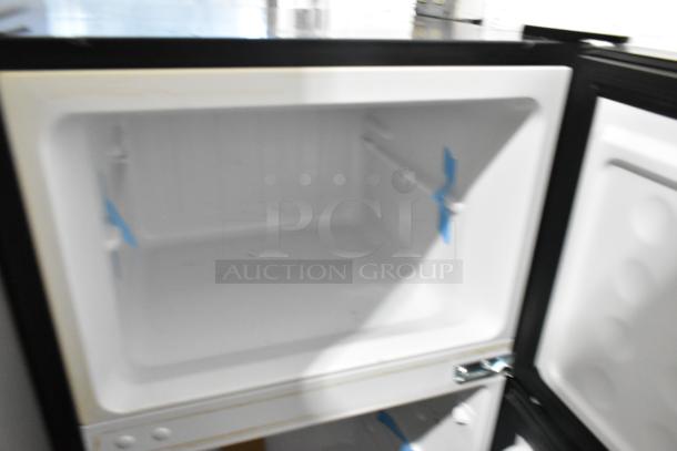 Vissani HVDR45PS stainless steel cooler with freezer, brand new condition, features 115 volts, 1 phase. Scratch and dent.