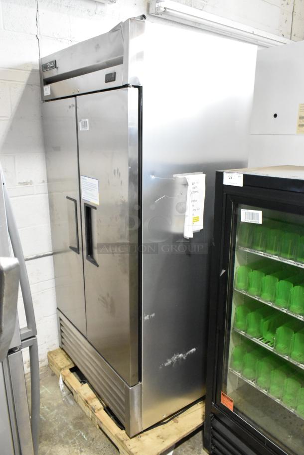 2020 True T-35-HC stainless steel commercial 2-door reach-in cooler with poly-coated racks, visible minor wear.
