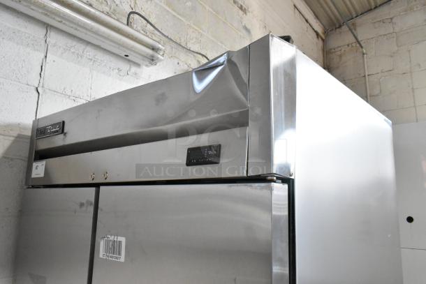 2020 True T-35-HC stainless steel 2-door reach-in cooler with poly-coated racks; seen in good condition.