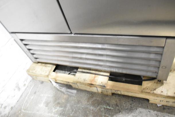 2020 True T-35-HC Stainless Steel Commercial Cooler on wooden pallet, showing lower vent. Condition appears maintained.