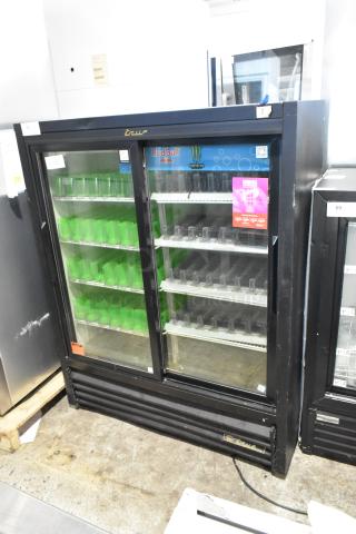 True GDM-41SL-60-LD commercial cooler, 2 glass doors, metal exterior, poly-coated racks, 115V, 1 phase, intact condition.