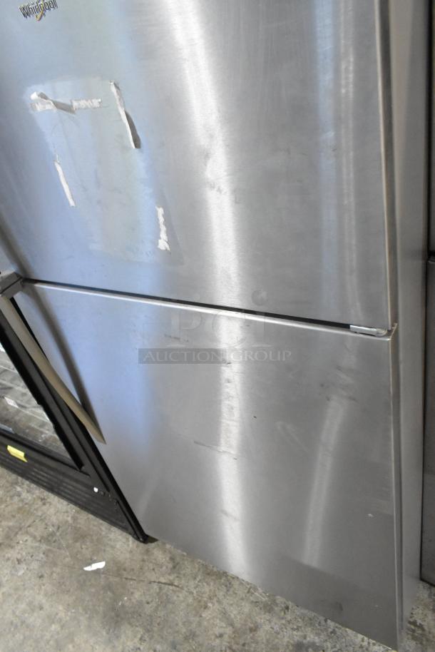 2024 Whirlpool WRT311FZDM15 stainless steel cooler with freezer, visible surface wear, 115V, 1 phase.