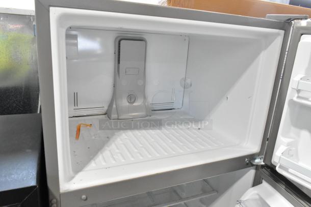2024 Whirlpool WRT311FZDM15 stainless steel cooler with freezer, model open showing interior, 115 volts, 1 phase.