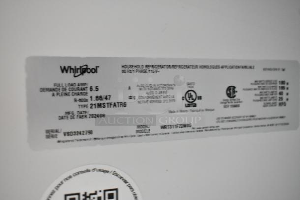 2024 Whirlpool WRT311FZDM15 stainless steel cooler with freezer, 115V, 1 phase, model tag displayed.
