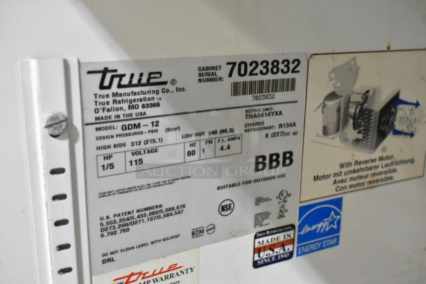 True GDM-12 cooler label, 115 volts, 1 phase, serial 7023832, made in USA, uses R134A refrigerant, ENERGY STAR rated.