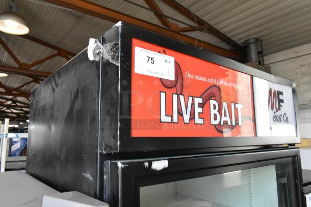 2023 True GDM-26-HC commercial cooler with single glass door, black metal exterior, live bait signage, poly-coated racks.