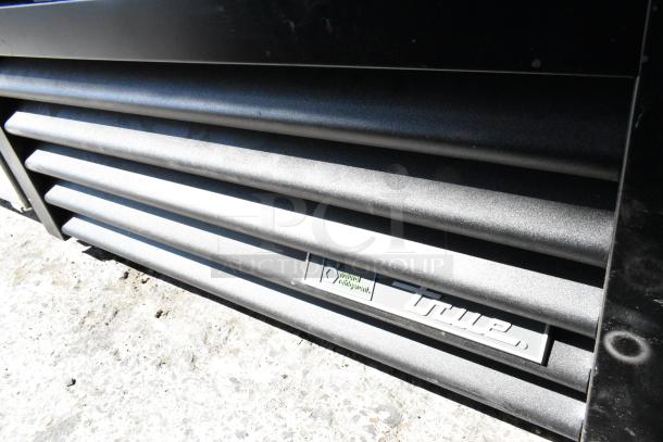 2023 True GDM-26-HC metal cooler with single door, poly coated racks, and 115V, 1 phase operation. Front vent detail.